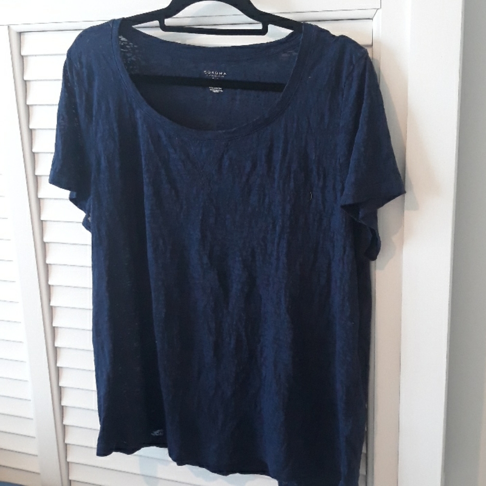 Navy Blue top, lacy and somewhat see through. Great with pencil skirt or jeans.